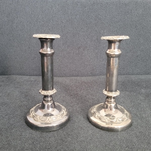 Pair of antique silver-plated candlesticks