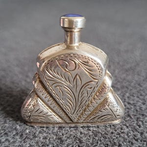 Vintage silver perfume bottle