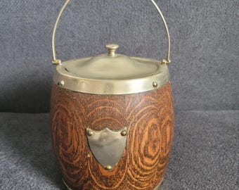 Antique oak biscuit barrel with silver-plated lid