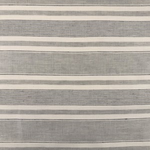 May include: White and grey striped fabric with a subtle texture. The fabric has a horizontal striped pattern.