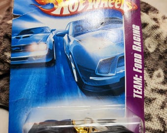 2008 Hot Wheels Ford GTX1: Black & Gold Racing Variant