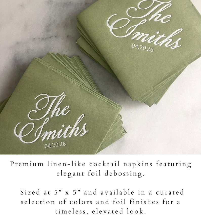 May include: A stack of sage green square cocktail napkins featuring white foil debossed text that reads The Smiths and the date 04.20.26. The napkins measure 5 inches by 5 inches and have a textured finish resembling linen fabric.