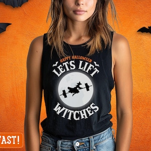 May include: Black tank top with the text "Happy Halloween Lets Lift Witches" and a graphic of a witch lifting weights in front of a full moon. The background is orange with black bat decorations.
