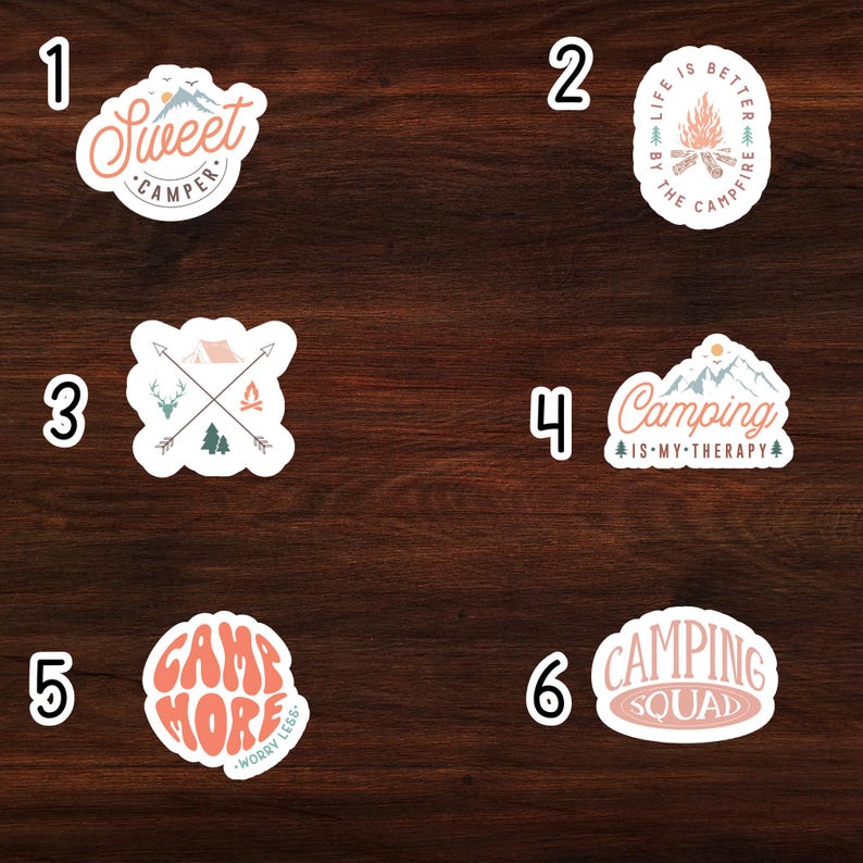 May include: Six different camping themed stickers on a wooden background. The stickers are all round and have different designs. The first sticker says "Sweet Camper". The second sticker says "Life is Better by the Campfire". The third sticker has a tent, two trees, and two deer. The fourth sticker says "Camping is My Therapy". The fifth sticker says "Camp More Worry Less". The sixth sticker says "Camping Squad".