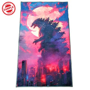 May include: A colorful illustration of Godzilla standing in front of a city skyline with a large pink moon in the background.