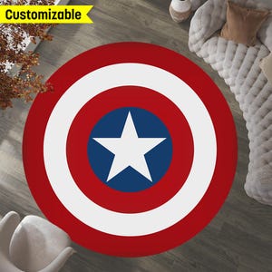 May include: A red, white, and blue circular rug with a white star on a blue background in the center. The rug has a concentric circle pattern.
