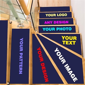 May include: A set of six blue stair treads with different colored text on each tread. The text reads "Your Logo", "Any Design", "Your Photo", "Your Text", "Your Image", and "Your Pattern".