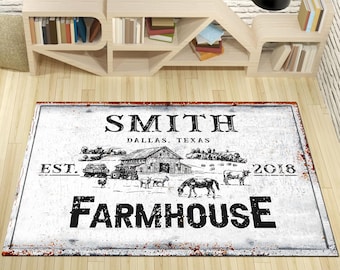 May include: White farmhouse style rug with a black and white illustration of a farmhouse, a truck, and animals. The text "Smith, Dallas, Texas, Est. 2018, Farmhouse" is printed on the rug.