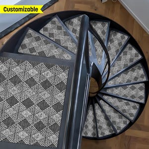 May include: A set of black and white patterned stair treads with a geometric design. The treads are made of a soft, durable material and are designed to provide traction and safety on stairs. The treads are customizable and can be ordered in a variety of sizes and colours.