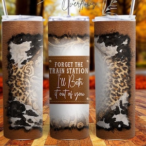 May include: A brown leather-look tumbler with a white and black leopard print design. The tumbler has a white sticker with the text "Forget the train station I'll Beth it out of you".