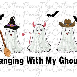 May include: Three cartoon ghosts with different costumes: a witch, a devil, and a cowboy. The ghosts are white with black eyes and smiling mouths. The text "Hanging With My Ghouls" is below the ghosts.