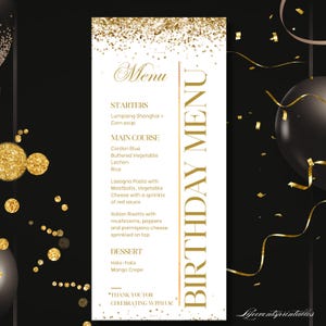 May include: A vertical birthday menu card with a white background, gold glitter accents at the top, and gold text. The menu lists starters, main courses, and desserts, with the words BIRTHDAY MENU printed vertically in large gold capital letters.