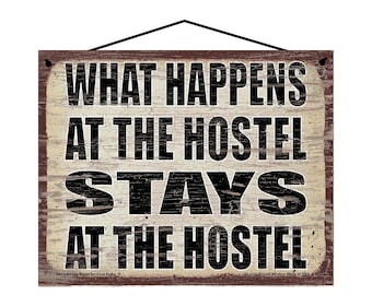 What Happens at the Hostel Stays at the Hostel - Vintage Style Hanging Sign - Home Decor Decorative Wall Art for Vacation Rentals, Hotels