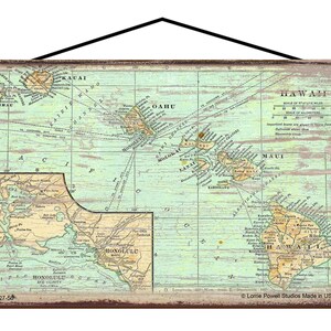 May include: A vintage-style wooden sign featuring a detailed map of Hawaii. The map, in shades of green, beige, and brown, highlights the islands with their names. The sign has a distressed look, with a black hanging cord at the top.