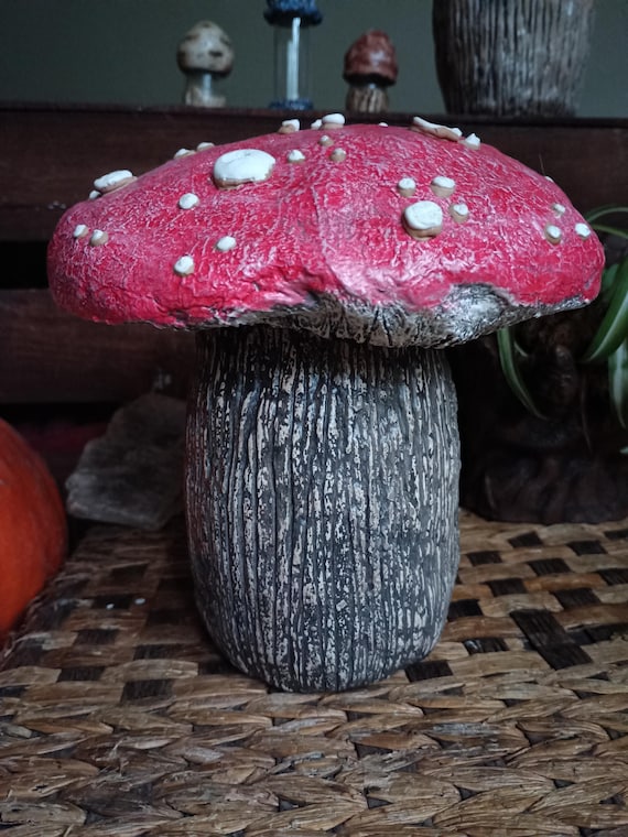 A genuinely handcrafted ceramic mushroom jar that doubles as functional boho decor — the kind of sculptural piece you'd spot on someone's shelf and immediately ask about.