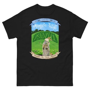 May include: Black t-shirt with a graphic of a groundhog wearing a hat and holding a spear. The graphic is set in a green field with a blue sky and the text "Penn State War XLVI Bloody L, Not Again!"