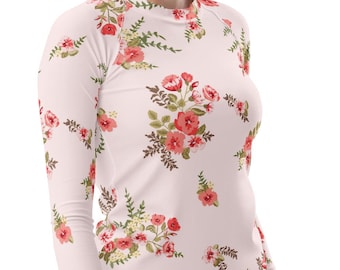 Camiseta de protección solar floral rosa para mujer