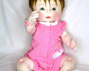 Bambola di peluche in tessuto