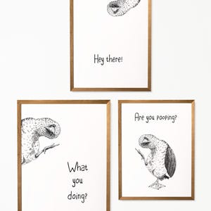 May include: Three framed prints with black and white illustrations of a bird. The top print says "Hey there!" The middle print says "What you doing?" The bottom print says "Are you pooping?"