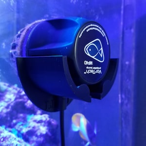 May include: A blue VorTech MP40 propeller pump with a black mounting bracket and a white fish logo. The pump is attached to a black cord.