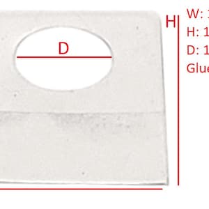 May include: White square-shaped adhesive label with a round hole in the center. The label measures 1 inch wide, 1 3/16 inches high, and the hole is 1/2 inch in diameter. The label is designed for a glue application of 1/2 inch.