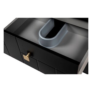 May include: A black drawer with a gold handle is open, revealing a grey plastic drawer organiser. The drawer has a textured, tile-like pattern.