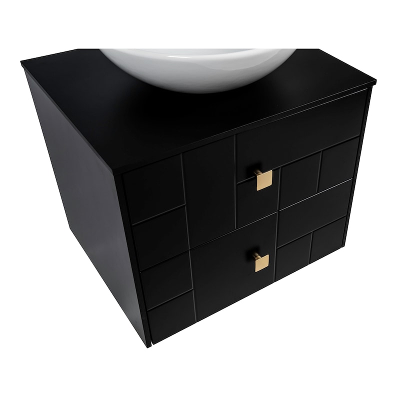 May include: Black bathroom vanity with two drawers and gold square drawer pulls. The vanity has a white ceramic sink on top.