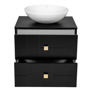 May include: Black bathroom vanity with two drawers and a white ceramic vessel sink. The drawers have gold square handles and a geometric pattern.