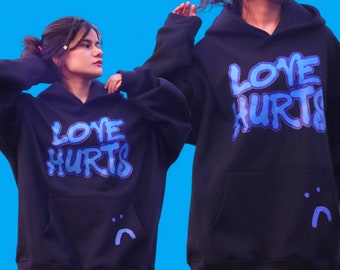 Love Hurts: sudadera con capucha de gran tamaño, peso pesado, estampado gráfico, ropa de calle unisex, 400 GSM, cantidad limitada.