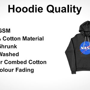 May include: A black hoodie featuring a blue and white NASA logo on the chest. Text on the left lists product details: Hoodie Quality, 400 GSM, 100% Cotton Material, Pre-Shrunk, Bio-Washed, Super Combed Cotton, and No Colour Fading.
