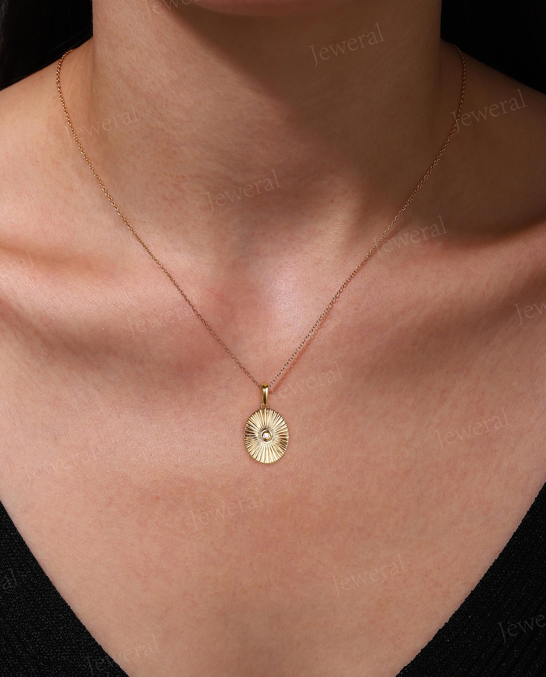 a close up of a woman wearing a necklace