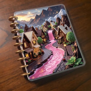 May include: A planner featuring a fantasy village scene with houses, a pink river, and mountains. The planner has a clear cover and gold spiral binding. The illustration has a whimsical style.