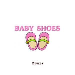 Può includere: Scarpine rosa ricamate con cinturini verdi, sotto la scritta "BABY SHOES". Il testo "2 Sizes" è sotto le scarpe. L'immagine è su sfondo bianco.