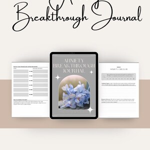 May include: A digital journal with a gray background and a floral design. The text "Anxiety Breakthrough Journal" is at the top of the page. The text "Soft Hearts & Brave Souls" is at the bottom of the page.