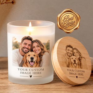 May include: A frosted glass candle with a lit wick, featuring a custom photograph of a couple and a dog on the front. Beside it sits a round wooden lid engraved with the same image. Both items display the text "YOUR CUSTOM IMAGE HERE".