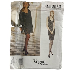 May include: Vintage Vogue pattern featuring a black lace dress and a matching sheer overlay. The pattern includes a dress with a scoop neckline and a sleeveless design. The package is labeled "Tom and Linda Platt, Vogue American Designer."