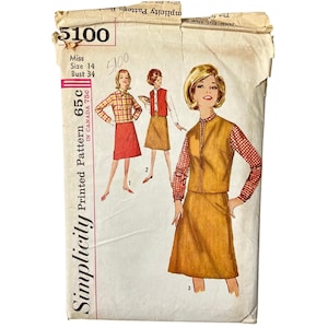 May include: Vintage Simplicity sewing pattern, style 5100, featuring illustrations of a three-piece outfit: a skirt, vest, and long-sleeved shirt. The pattern includes sizing information: Miss Size 14, Bust 34 inches. The pattern is marked 65c in Canada 75c.
