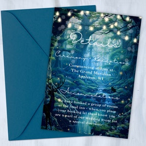 May include: A wedding invitation with a blue background and a forest scene with a deer and a stream. The text reads "Details Ceremony Reception Commencing at 5pm at The Grand Meridian Appleton, WI Accommodations We have booked a group of rooms at the local inn - when you place your booking let them know you are a part of our wedding event for a special discount."