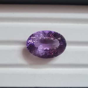 Faceted Oval Amethyst Gemstone: 40 CT, 27x19 MM Unique Cut