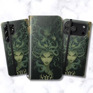 May include: Three phone cases featuring a dark green and black illustration of a figure with snakes for hair. The design shows a central face with intense eyes surrounded by coiled, serpentine forms. Each case is secured with a black elastic band.