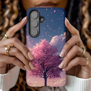 May include: A navy blue phone case featuring a pink cherry blossom tree with falling petals against a cloudy sky. The case has a dark blue border and a camera cutout.