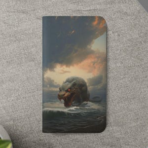 May include: A vertical wallet featuring a dramatic illustration of a sea monster emerging from ocean waves under a cloudy sky. The monster has red eyes and an open mouth. The wallet is rectangular and made of a smooth material.