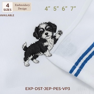 May include: White fabric with an embroidered black and white puppy design. The puppy is waving its paw. The text "4 SIZES AVAILABLE" and "Embroidery Design" are in the upper left corner. The text "4" 5" 6" 7"" is in the upper right corner.