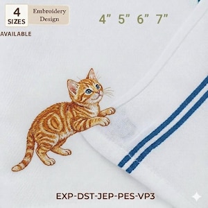 May include: White embroidered towel with an orange tabby kitten and blue eyes. The towel has blue stripes and the text "4 SIZES AVAILABLE" and "4" 5" 6" 7". The design is an embroidery.
