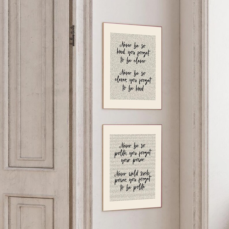 May include: Two framed art prints with inspirational quotes in black script on a cream background. The top print reads "Never be so kind, you forget to be clever. Never be so clever, you forget to be kind." The bottom print reads "Never be so polite, you forget your power. Never weld such power, you forget to be polite."