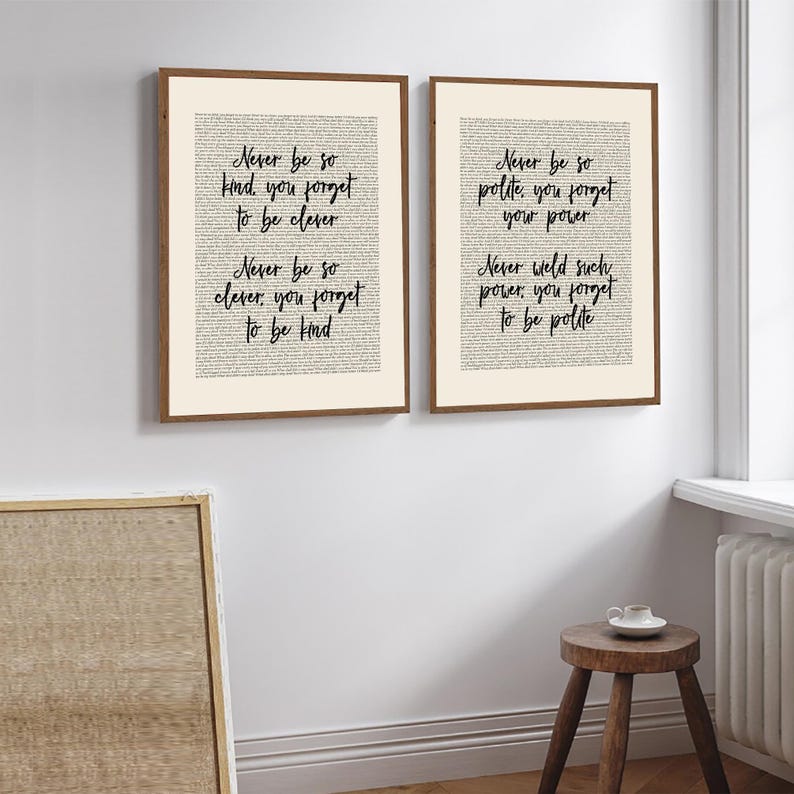 May include: Two framed art prints with inspirational quotes in black script on a cream background. The frames are a warm brown. The quotes include phrases like "Never be so kind, you forget to be clever."