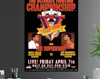 May include: A poster advertising The Ultimate Fighting Championship V, featuring a fight between Royce Gracie and Ken Shamrock. The poster is red, black, and white with a large "V" in the center. The text "The Superfight" is written in large letters at the bottom of the poster.
