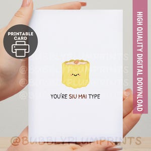 May include: A white printable card featuring a cartoon siu mai dumpling illustration and the text "You're Siu Mai Type". The card also has a "Printable Card" icon and a vertical pink banner that says "High Quality Digital Download".