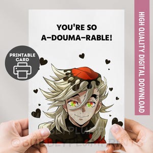 May include: A white printable card with the text "YOU'RE SO A-DOUMA-RABLE!". The card features an anime character with blonde hair and a red hat, surrounded by black hearts. A pink vertical banner reads "HIGH QUALITY DIGITAL DOWNLOAD".