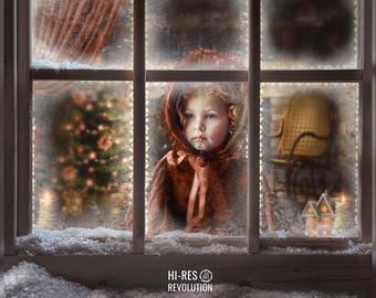 May include: A young girl wearing a red hooded coat peers out of a frosted window. The window is decorated with white lights and there is snow on the windowsill. A Christmas tree can be seen in the background.